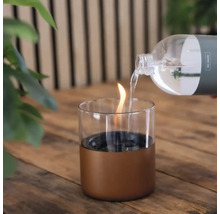 Lampă decorativă de masă cu combustibil este umplută