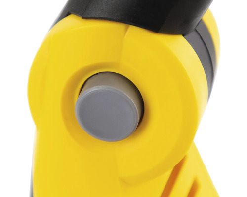 Prim-plan cu o unealtă galbenă cu un buton gri