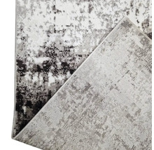 Covor decorativ cu model abstract pentru interior.