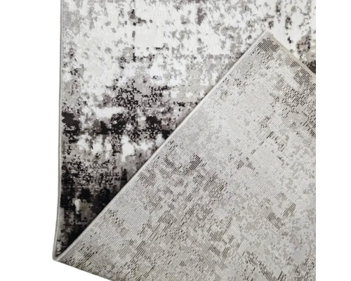 Covor decorativ cu model abstract pentru interior.