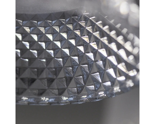 Prim-plan cu o suprafață transparentă cu un model triunghiular