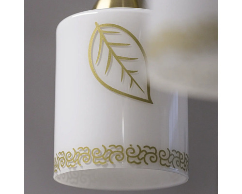 Detaliu al unei lămpi cu motiv de frunze