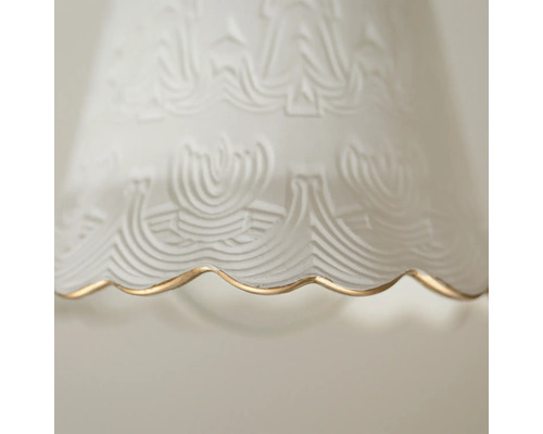 Prim-plan al unui abajur din sticlă cu decor și margine aurie