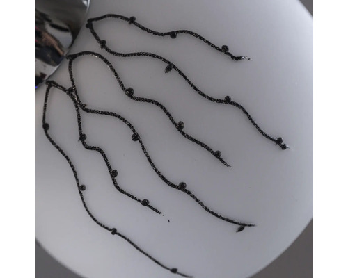 Detaliu lampă cu linii decorative