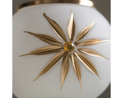 Prim-plan al unei lămpi cu model floral