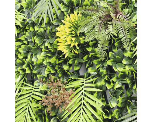 Perete artificial de plante cu diverse frunze și plante