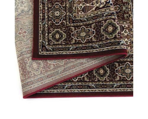 Vizualizare detaliată a unui covor cu model floral