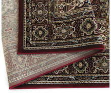 Detaliu cu un covor cu model cu o textură țesută