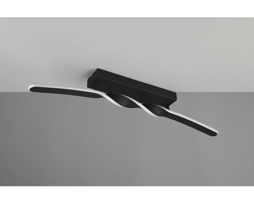 Lumină de plafon cu design răsucit pe un tavan