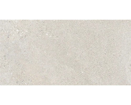 Placă ceramică porțelanată de culoare deschisă cu suprafață pestriță