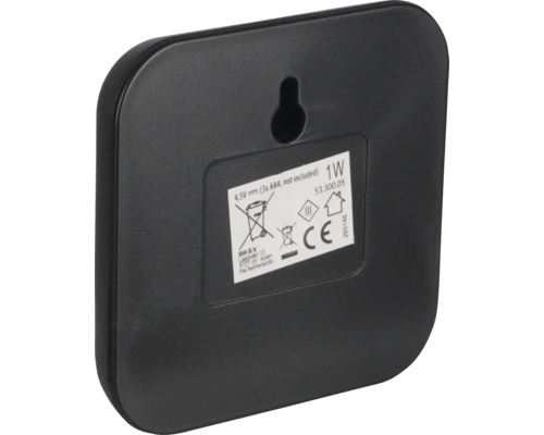 Partea din spate a unei stații meteo cu informații despre baterie, putere și producător