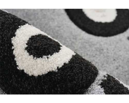 Prim-plan cu un covor cu model