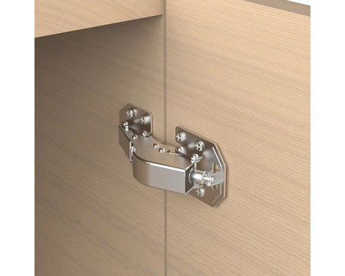 Balama de mobilă fixată pe o suprafață din lemn