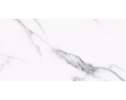 Prim-plan cu o faianță albă cu marmorare.