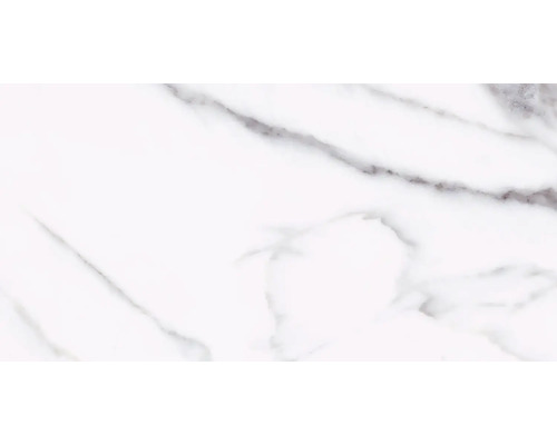 Prim-plan cu o faianță albă cu marmorare.