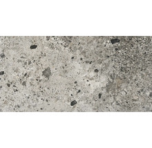 Prim-plan cu o placă de podea din beton cu model de terrazzo