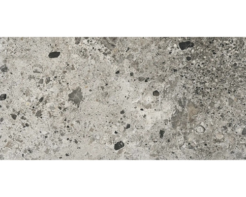 Prim-plan cu o placă de podea din beton cu model de terrazzo