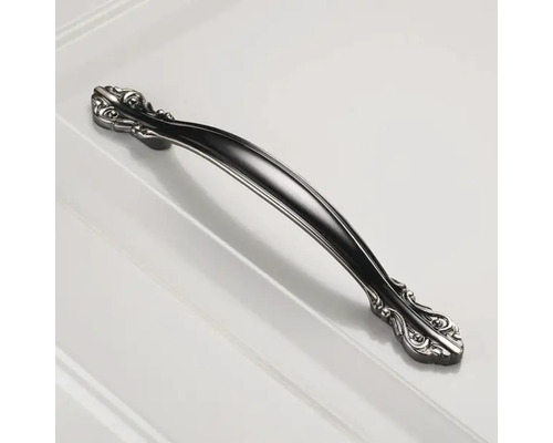 Mâner de mobilă cu decorațiuni ornamentale