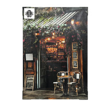 Pânză decorativă cu motivul unui bar în stil vintage, cu mese și scaune în aer liber