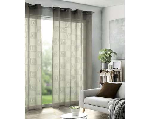 Perdea decorativă cu model spiralat în sufragerie.