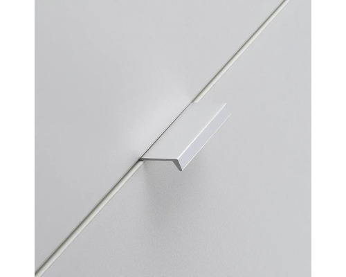 Prim-plan al unui mâner de sertar metalic