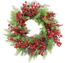Coroană decorativă cu fructe de pădure și ramuri de brad ca decorațiune festivă