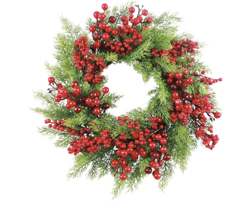 Coroană decorativă cu fructe de pădure și ramuri de brad ca decorațiune festivă
