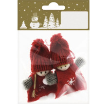 Două figurine pentru pomul de Crăciun într-un ambalaj.