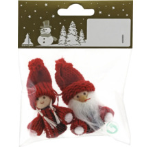 Doi spiriduși decorativi de Crăciun într-un ambalaj transparent.