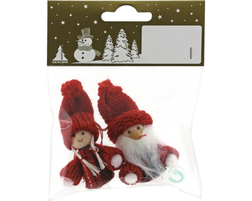 Doi spiriduși decorativi de Crăciun într-un ambalaj transparent.