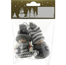 Două păpuși tricotate ca decorațiuni de pom de Crăciun într-o pungă de plastic transparentă