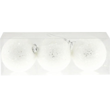 Trei globuri de Crăciun albe cu sclipici într-un ambalaj transparent.