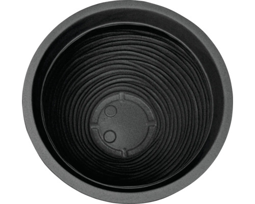 Vedere interioară a unui vas rotund de flori din plastic