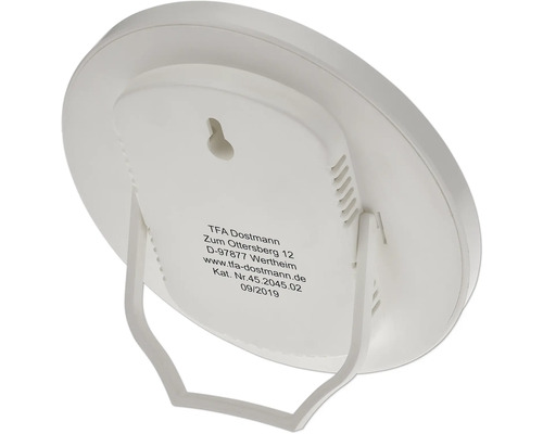 Vedere din spate a unui higrometru rotund cu suport