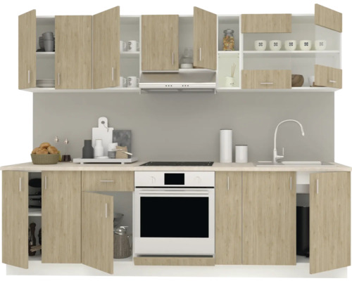 Bucătărie modernă cu dulapuri superioare și inferioare, chiuvetă, aragaz și cuptor.