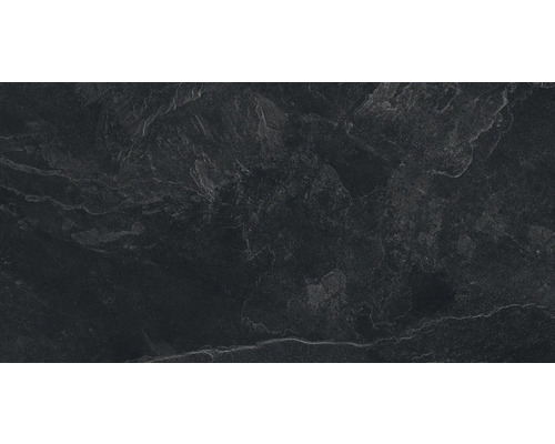 Placă de ardezie închisă la culoare cu suprafață texturată.