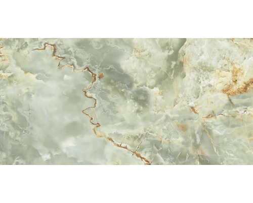 Prim-plan cu o placă de onix verde cu nervuri maro