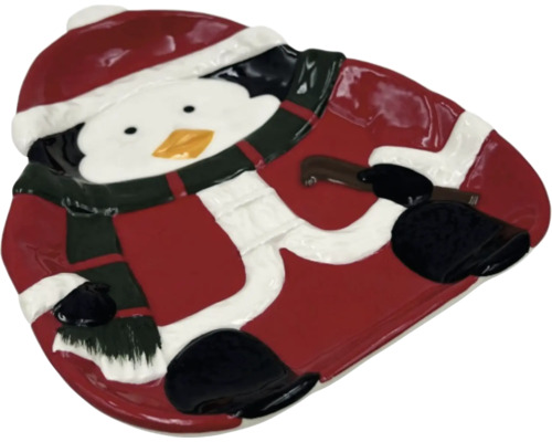 Farfurie în formă de pinguin cu îmbrăcăminte de iarnă