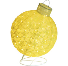 Glob de Crăciun galben cu model de fulgi de zăpadă și iluminare pe un suport