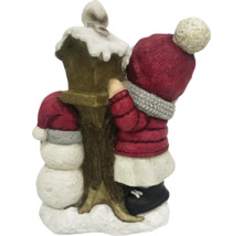 Decorațiune de Crăciun cu om de zăpadă și copil lângă un felinar