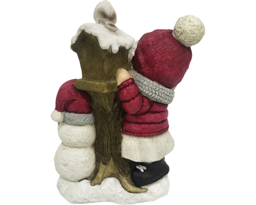 Decorațiune de Crăciun cu om de zăpadă și copil lângă un felinar