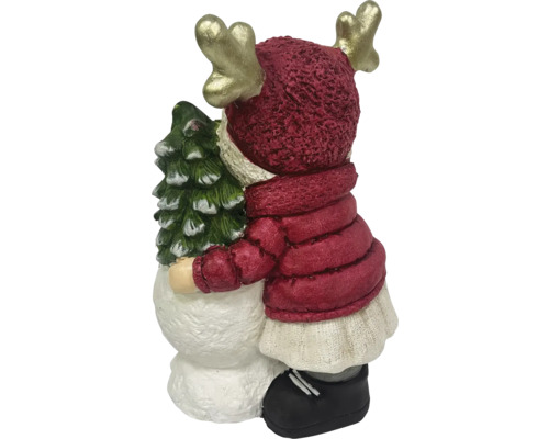 Figurina decorativă ren îmbrățișând un pom de Crăciun.