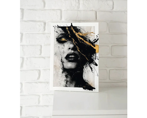 Lucrare de artă înrămată cu chip abstract de femeie