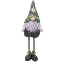 Spiriduș de Crăciun cu barbă lungă și picioare în dungi