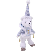 Urs polar decorativ cu căciulă și schiuri ca decorațiune de Crăciun