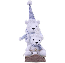 Urși polari decorativi pe o sanie cu căciulă și fular