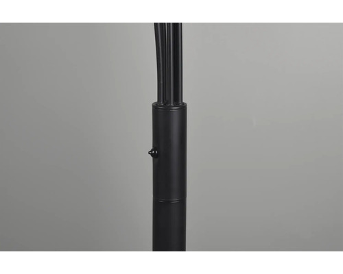 Prim-plan al trepiedului reglabil pe înălțime al unei lămpi.