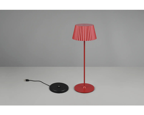Lampă de masă roșie cu abajur plisat și stație de încărcare