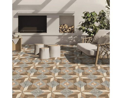 Terasa cu gresie cu model geometric, locuri de ședere și șemineu