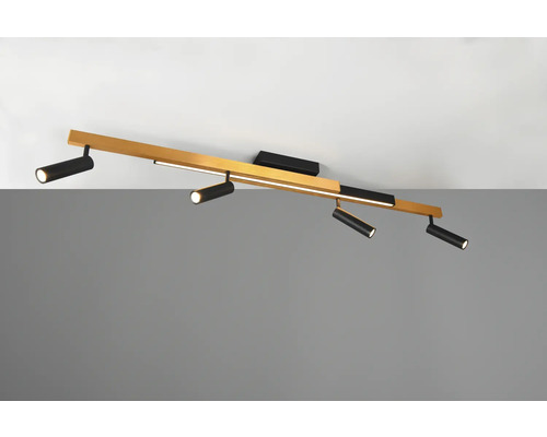 Lumină de plafon cu spoturi pe o bară de lemn